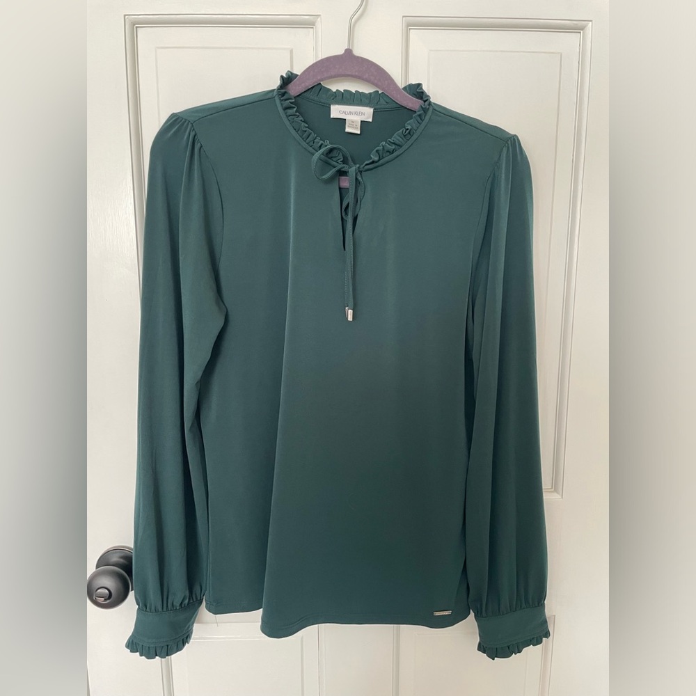 Calvin Klein dark green knit blouse. Medium. Long sleeve. Tie at neck.